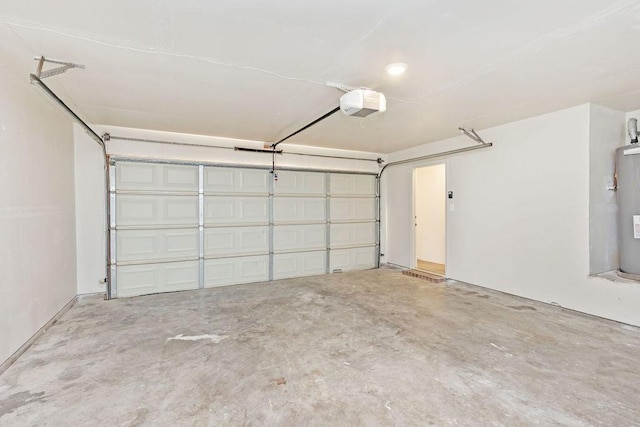 5907 Cohoke Dr, Arlington, TX 76018 - garage with a garage door opener and electric water heater