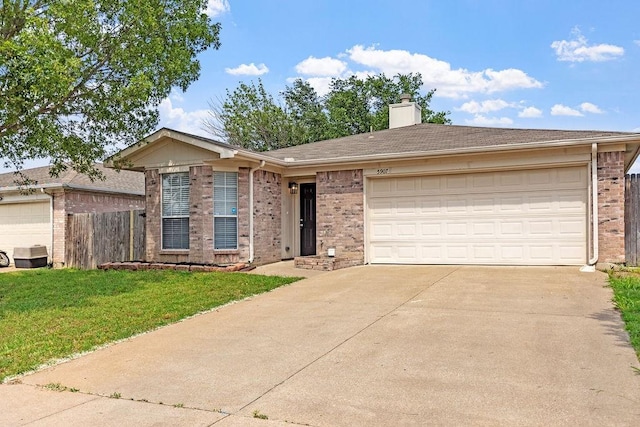 5907 Cohoke Dr, Arlington, TX 76018 - ranch-style house with brick siding, concrete driveway, a garage, and a chimney