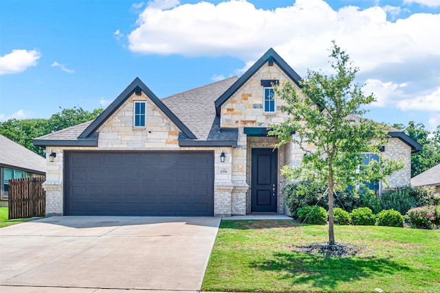 208 Rosemary Dr, Azle, TX 76020 - view of front of property featuring stone siding, a front lawn, concrete driveway, and a garage