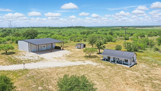 18230 Interstate 20, Cisco, TX 76437 - aerial view of property and surrounding area with a heavily wooded area