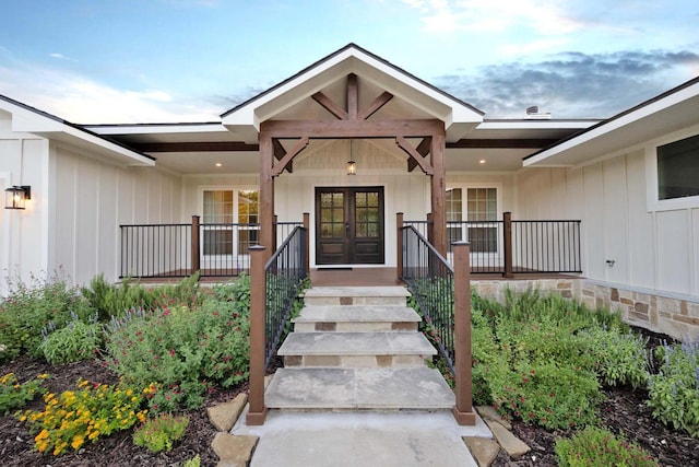 4107 Highland Rd, Melissa, TX 75454 - doorway to property with french doors, board and batten siding, and a porch