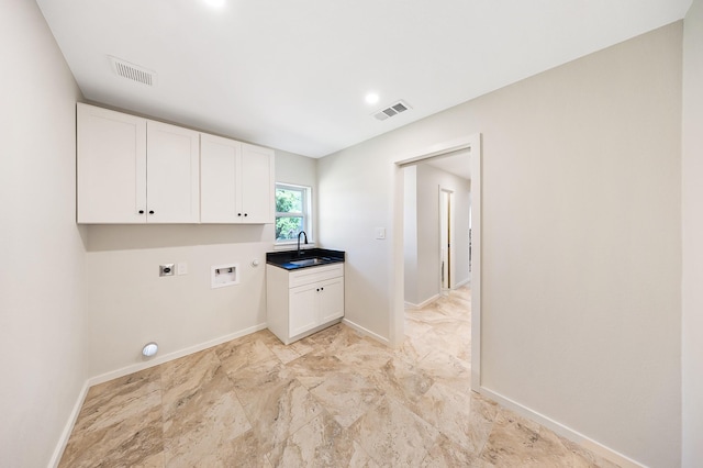 4107 Highland Rd, Melissa, TX 75454 - laundry room with hookup for an electric dryer, hookup for a washing machine, cabinet space, and baseboards