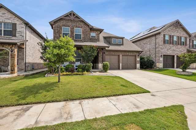 3740 Holly Brook Dr, Fort Worth, TX 76244 - view of front of property featuring brick siding, concrete driveway, a front yard, and roof with shingles