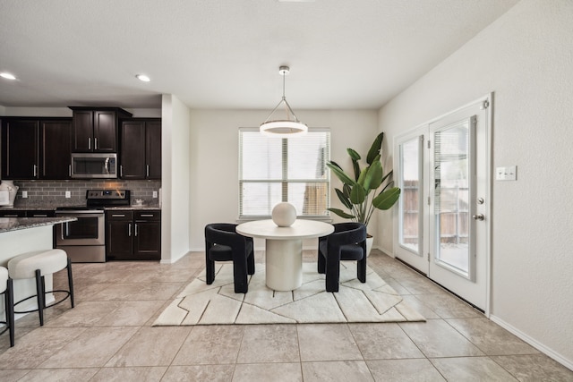 3740 Holly Brook Dr, Fort Worth, TX 76244 - dining room featuring baseboards and light tile patterned floors
