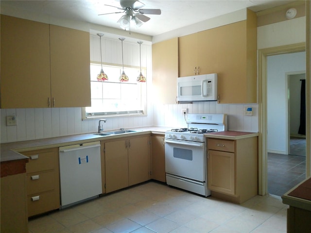 750 Ross Ave, Abilene, TX 79605 - kitchen with white appliances, ceiling fan, a sink, and light countertops