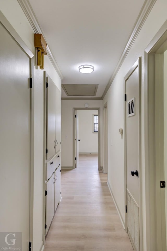 808 E St, Minden, LA 71055 - corridor with light wood-type flooring, crown molding, and baseboards