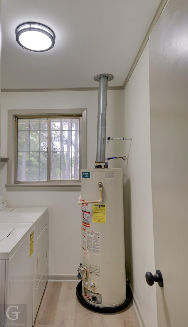 808 E St, Minden, LA 71055 - utility room with washer and clothes dryer and water heater