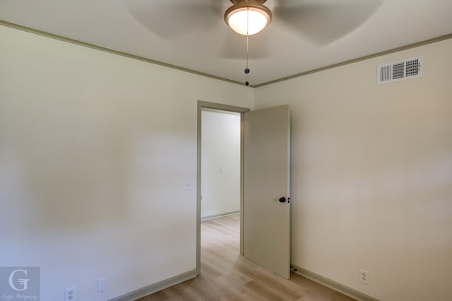 808 E St, Minden, LA 71055 - unfurnished room with ceiling fan, light wood finished floors, and baseboards