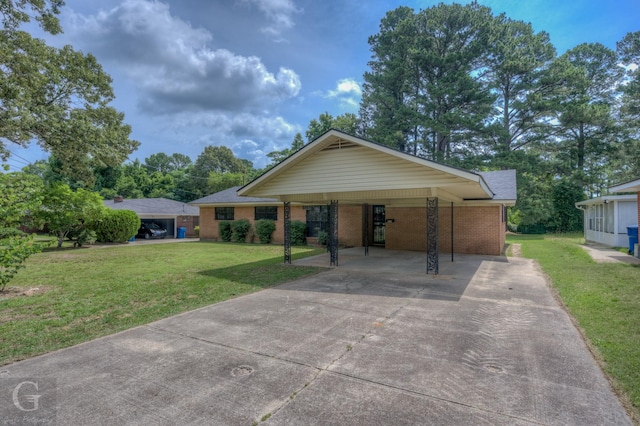 808 E St, Minden, LA 71055 - ranch-style home with driveway, a front lawn, and brick siding