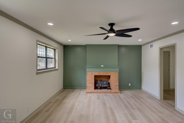 808 E St, Minden, LA 71055 - unfurnished living room with ornamental molding, light wood-style floors, recessed lighting, a ceiling fan, and baseboards