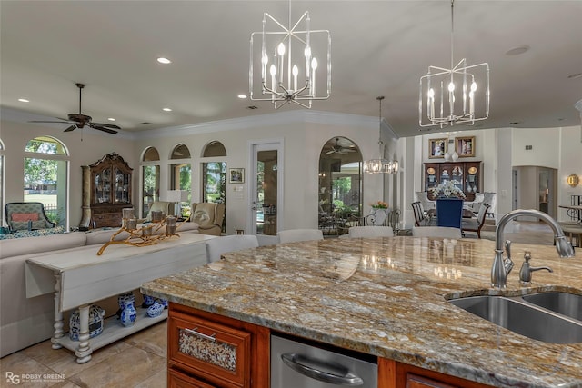 609 Enchanted Ln, Bossier City, LA 71111 - kitchen with a sink, a chandelier, open floor plan, a ceiling fan, and ornamental molding