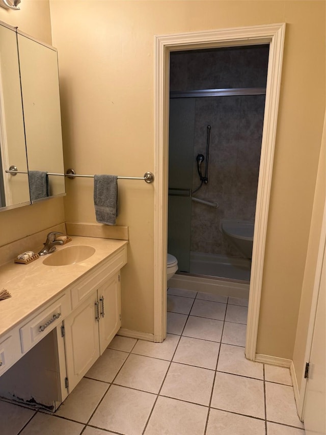 8622 Jackson Square Pl, Shreveport, LA 71115 - full bathroom with vanity, tile patterned floors, toilet, a shower stall, and baseboards
