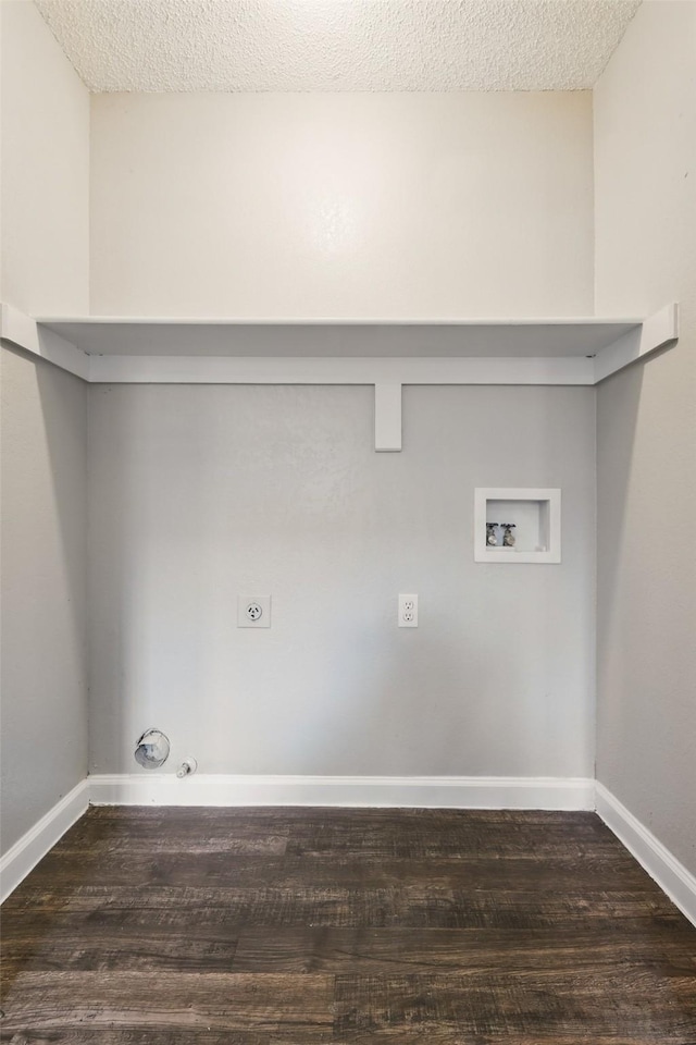 703 Inglewood Trl, Desoto, TX 75115 - laundry area with hookup for an electric dryer, washer hookup, hookup for a gas dryer, dark wood-style floors, and baseboards