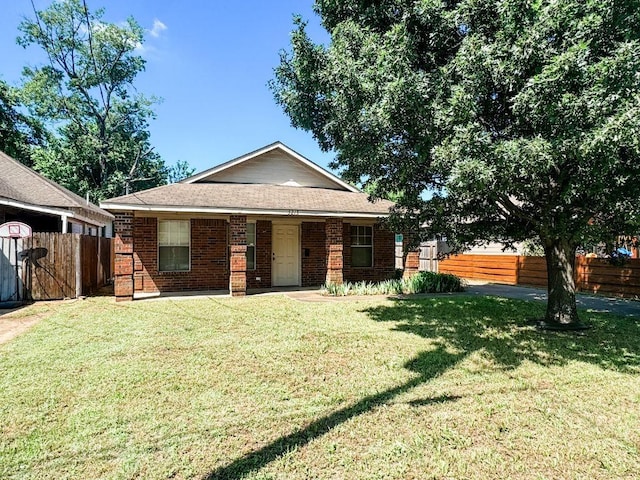 5215 Colonial Ave, Dallas, TX 75215 - view of front of property with brick siding and roof with shingles