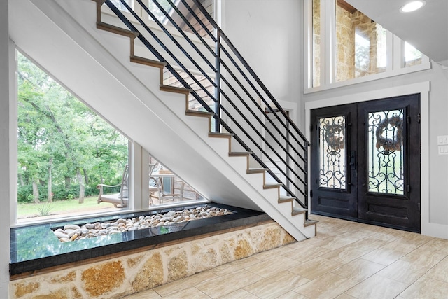 6501 Hillcrest Rd, Flower Mound, TX 75022 - entrance foyer with stairs and a towering ceiling