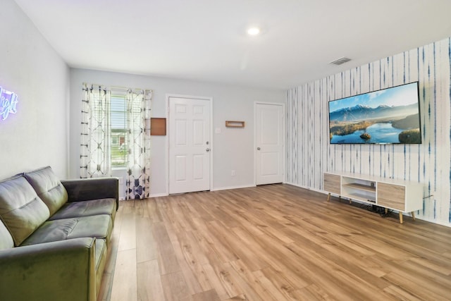 5431 Longshadow Dr, Princeton, TX 75407 - unfurnished living room with wallpapered walls, light wood-style flooring, and baseboards