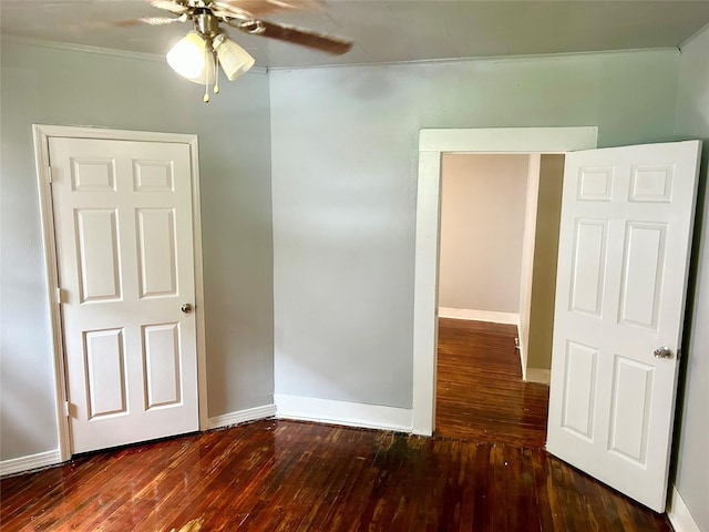 2927 Regent St, Shreveport, LA 71109 - unfurnished bedroom with hardwood / wood-style flooring, ornamental molding, baseboards, and a ceiling fan