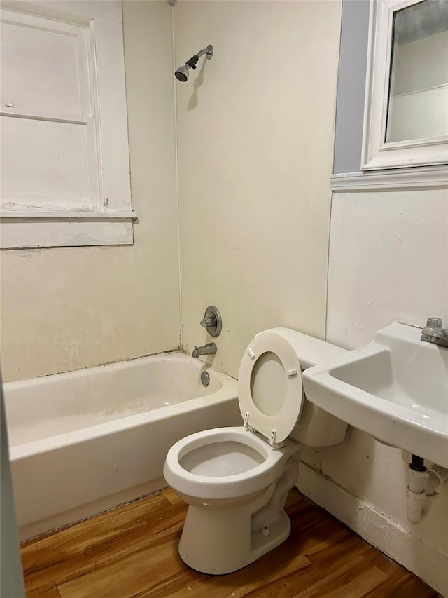 2927 Regent St, Shreveport, LA 71109 - full bath with toilet, shower / tub combination, and wood finished floors