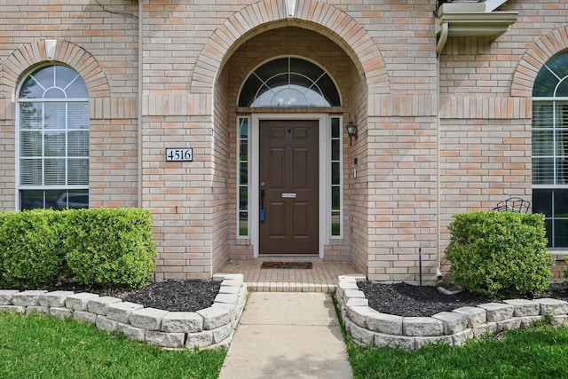 4516 Ridgepointe Dr, The Colony, TX 75056 - view of exterior entry with brick siding