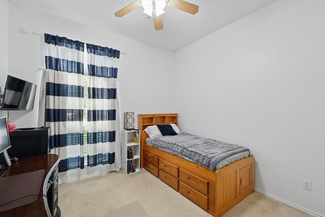 4516 Ridgepointe Dr, The Colony, TX 75056 - carpeted bedroom with an office area, a ceiling fan, and multiple windows