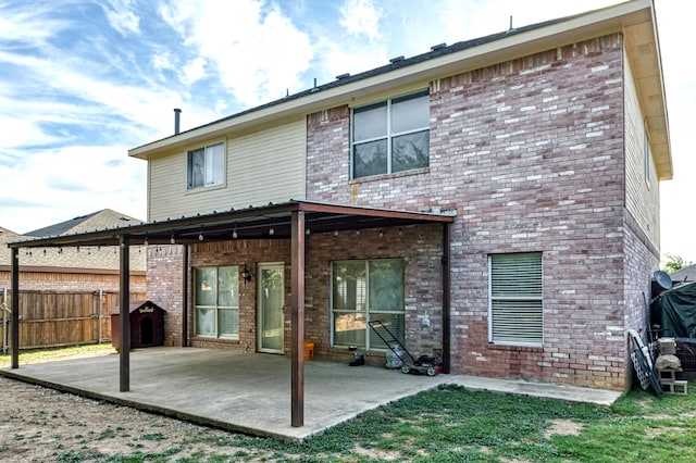 1505 Yellowbird Ct, Desoto, TX 75115 - rear view of house featuring a patio area and brick siding