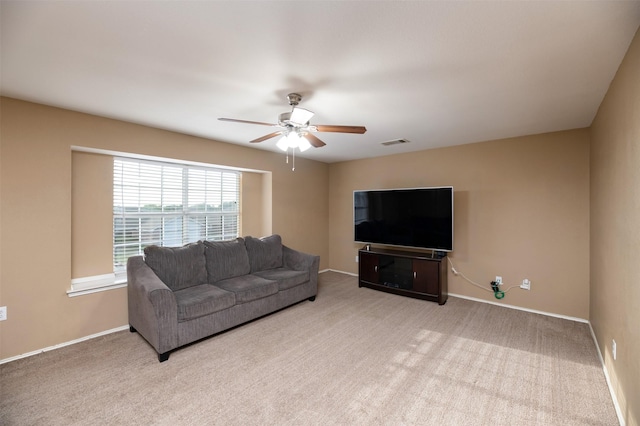 1505 Yellowbird Ct, Desoto, TX 75115 - carpeted living room featuring ceiling fan and baseboards