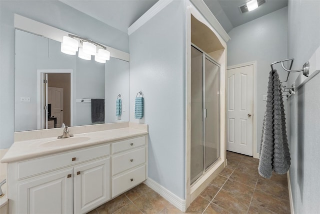 621 S Ruidoso Downs Dr, Robinson, TX 76706 - full bathroom featuring vanity, a stall shower, and baseboards