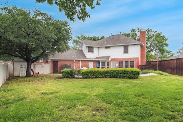 1418 Harmony Ln, Carrollton, TX 75006 - rear view of property featuring brick siding, a chimney, and roof with shingles