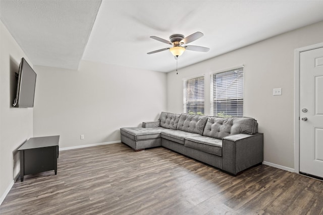 1905 W Morton St Unit 6, Denison, TX 75020 - living room with dark wood-style floors, a ceiling fan, and baseboards