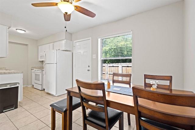 1905 W Morton St Unit 6, Denison, TX 75020 - dining space featuring a ceiling fan and light tile patterned floors