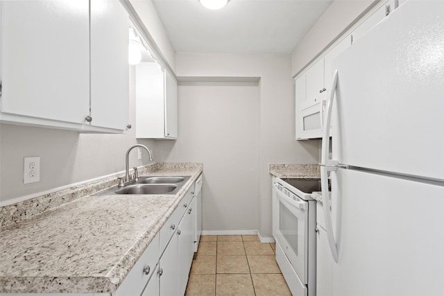 1905 W Morton St Unit 6, Denison, TX 75020 - kitchen featuring white appliances, a sink, white cabinetry, and light countertops