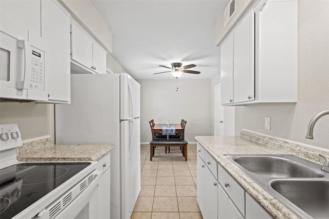 1905 W Morton St Unit 6, Denison, TX 75020 - kitchen with white appliances, a sink, ceiling fan, light countertops, and white cabinets