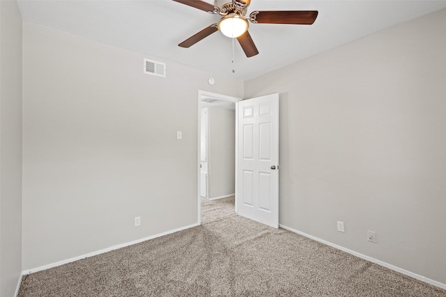 1905 W Morton St Unit 6, Denison, TX 75020 - empty room with carpet flooring, ceiling fan, and baseboards