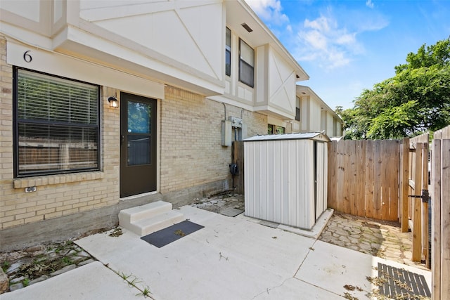 1905 W Morton St Unit 6, Denison, TX 75020 - fenced backyard with entry steps and a patio area