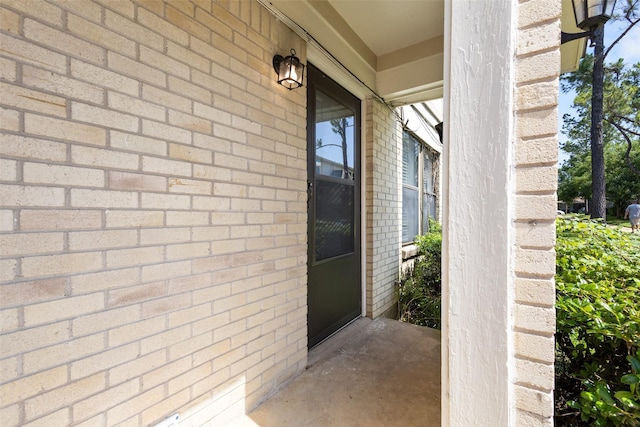 1905 W Morton St Unit 6, Denison, TX 75020 - property entrance with brick siding