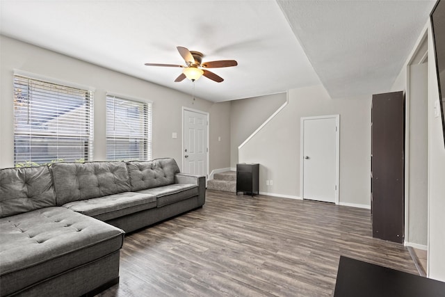 1905 W Morton St Unit 6, Denison, TX 75020 - living room with ceiling fan, wood finished floors, and baseboards