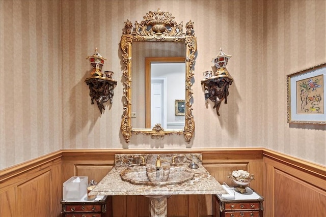 1708 Deepdale Dr, Westover Hills, TX 76107 - bathroom featuring wainscoting, a sink, and wallpapered walls