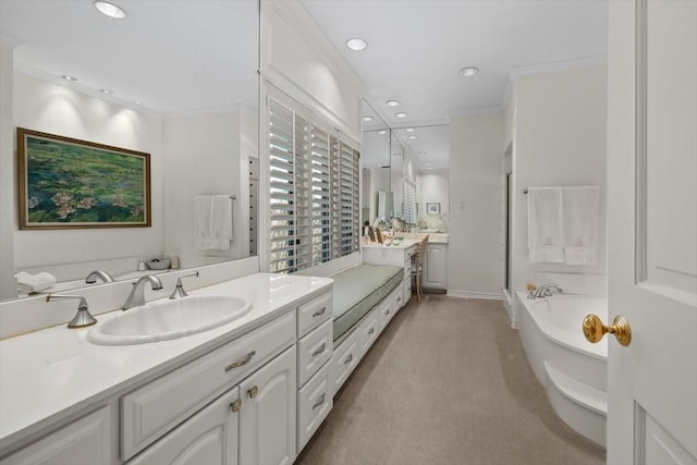 1708 Deepdale Dr, Westover Hills, TX 76107 - bathroom featuring a freestanding tub, vanity, recessed lighting, and ornamental molding