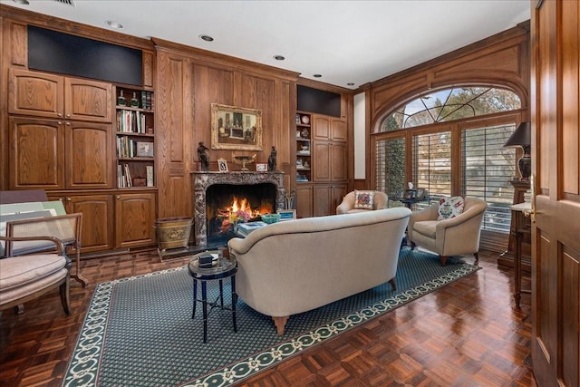 1708 Deepdale Dr, Westover Hills, TX 76107 - living area featuring a high end fireplace, built in shelves, and recessed lighting