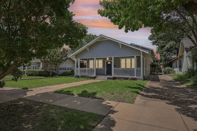 3804 Mattison Ave, Fort Worth, TX 76107 - bungalow-style home with a front yard, a porch, and concrete driveway