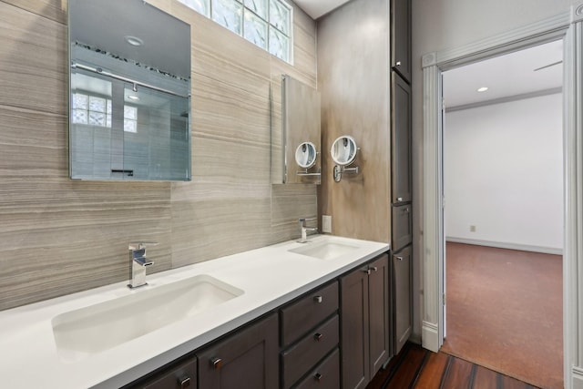 3804 Mattison Ave, Fort Worth, TX 76107 - full bath with decorative backsplash, double vanity, and wood finished floors