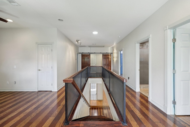 3804 Mattison Ave, Fort Worth, TX 76107 - corridor with dark wood finished floors, recessed lighting, and a barn door