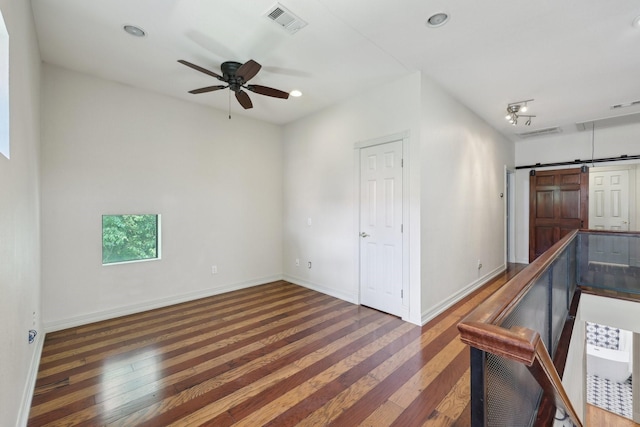 3804 Mattison Ave, Fort Worth, TX 76107 - spare room with hardwood / wood-style flooring, a ceiling fan, a barn door, and recessed lighting