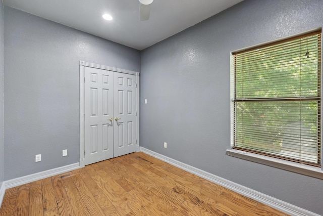 3804 Mattison Ave, Fort Worth, TX 76107 - unfurnished bedroom with light wood-style floors, a closet, and ceiling fan
