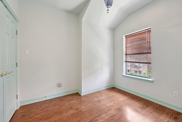 3804 Mattison Ave, Fort Worth, TX 76107 - empty room with wood finished floors and vaulted ceiling