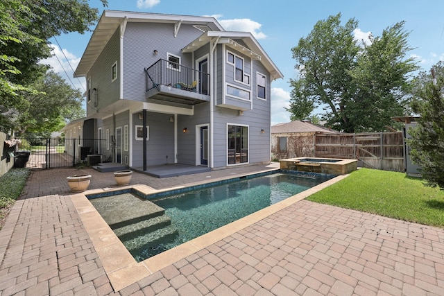 3804 Mattison Ave, Fort Worth, TX 76107 - back of property with a balcony, a patio area, a fenced backyard, and a pool with connected hot tub