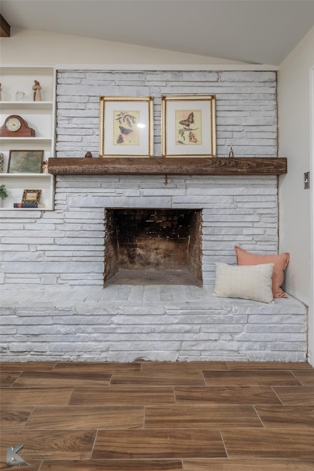 3126 Salinas Dr, Abilene, TX 79605 - detailed view of wood finished floors and a large fireplace