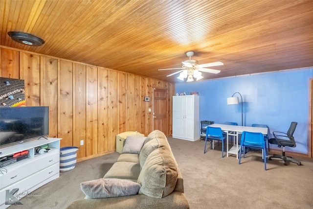 3126 Salinas Dr, Abilene, TX 79605 - carpeted living room featuring wooden ceiling, ceiling fan, and wood walls