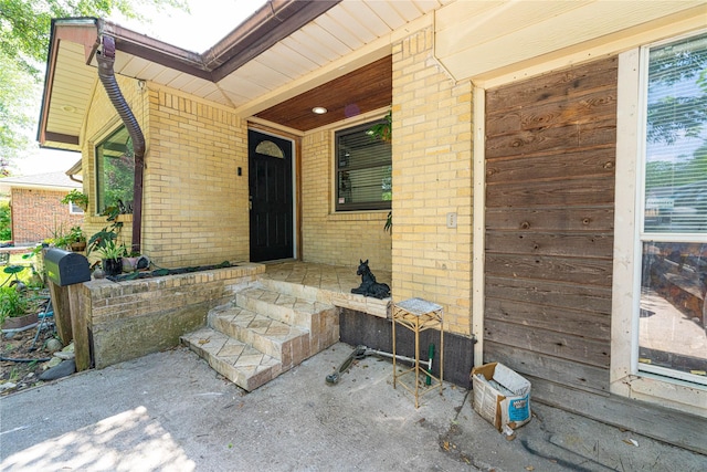 11103 Tascosa St, Dallas, TX 75228 - doorway to property with brick siding and covered porch