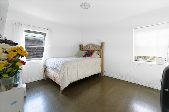 11103 Tascosa St, Dallas, TX 75228 - bedroom with dark wood-style flooring and baseboards